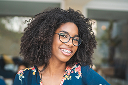 smiling woman with metal braces