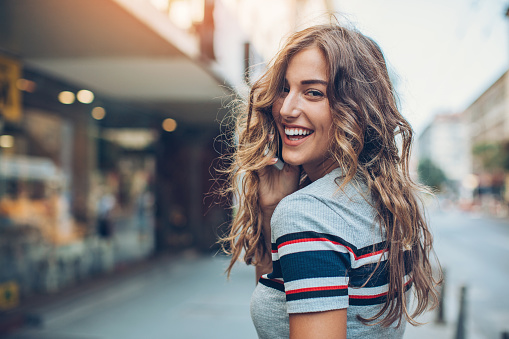 young woman smiling with great teeth from Brush & Floss Center in Stratford, CT